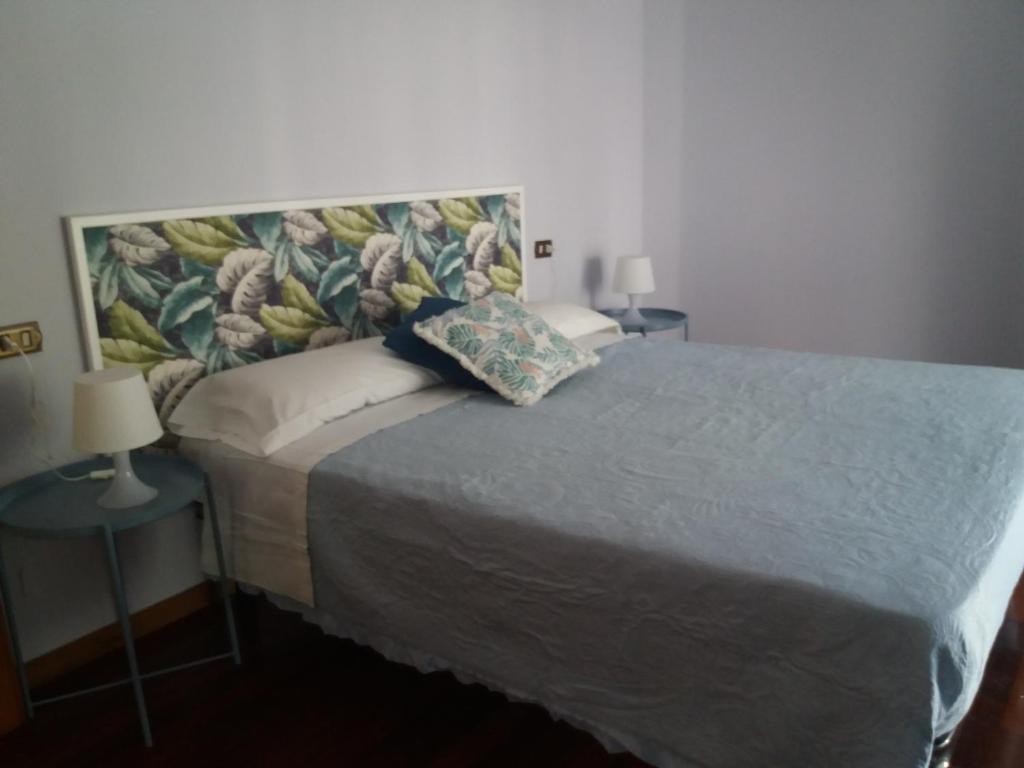 Postel nebo postele na pokoji v ubytování Baki B&B