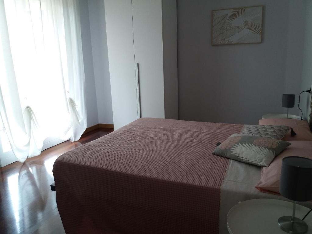 Postel nebo postele na pokoji v ubytování Baki B&B