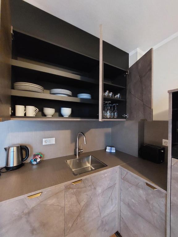 Kuchyňa alebo kuchynka v ubytovaní Komfort Appartements serviced by Auhof