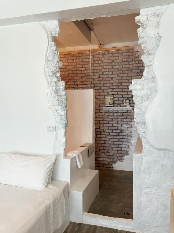 Postel nebo postele na pokoji v ubytování White&Light B&B