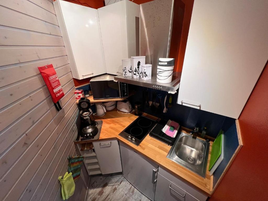 Kuchyň nebo kuchyňský kout v ubytování Ferienhaus Leuchtturm