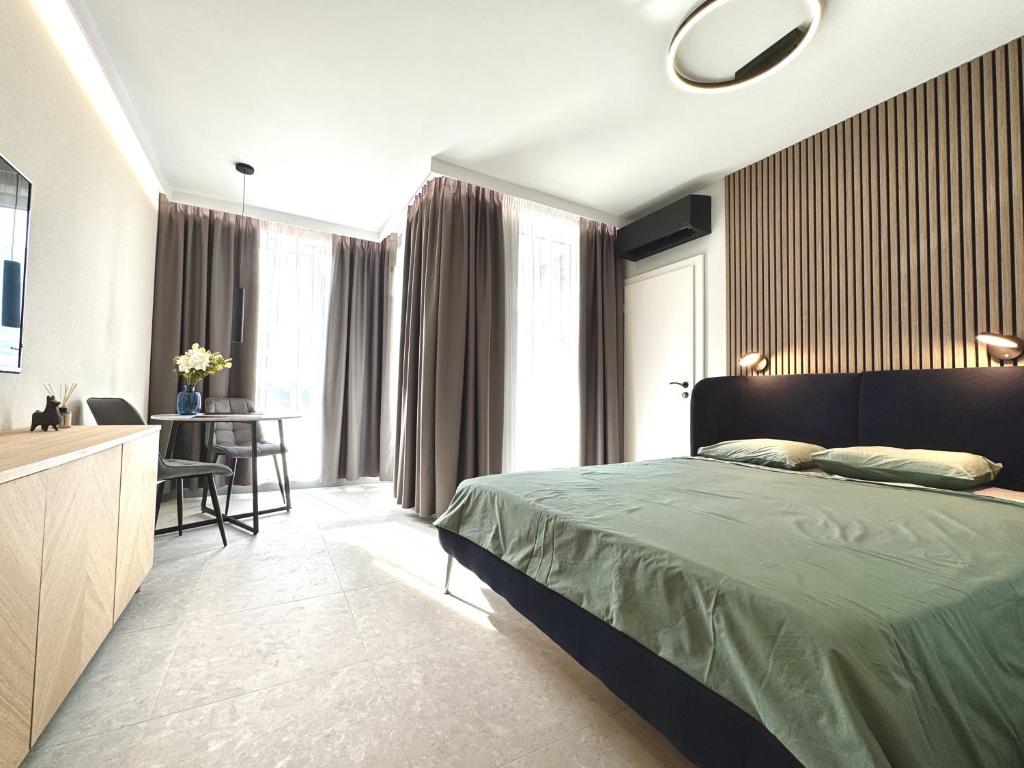 Katil atau katil-katil dalam bilik di Eleve Residences Sofia