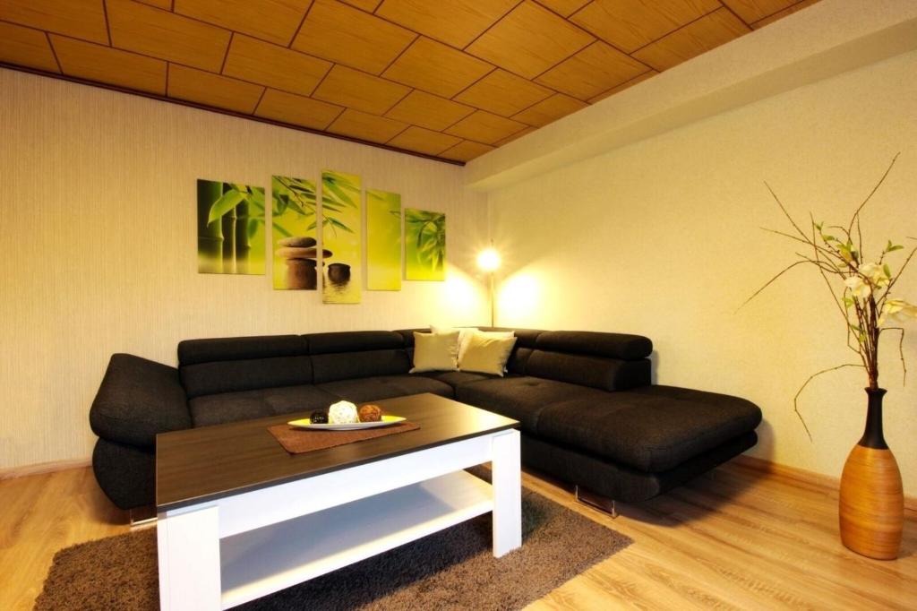 Posezení v ubytování Ferienwohnung am Kurpark