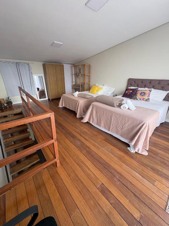 Postel nebo postele na pokoji v ubytování Govinda House