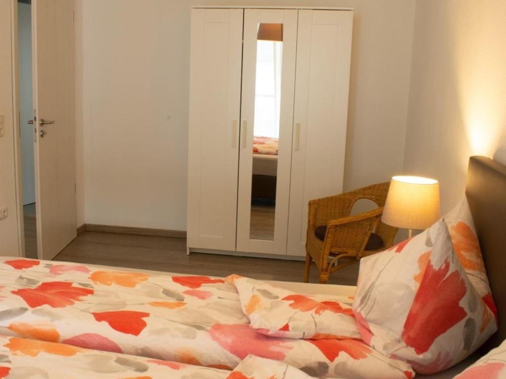 Postel nebo postele na pokoji v ubytování Ferienwohnung Gute Zeit - Apartment 2