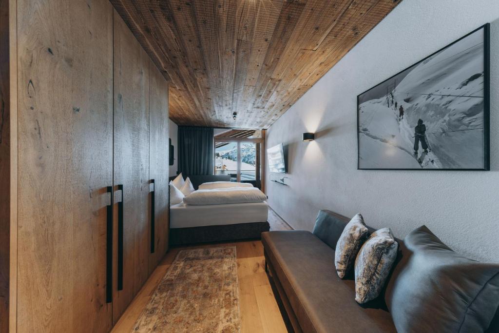 Postel nebo postele na pokoji v ubytování Balma Restaurant Suites