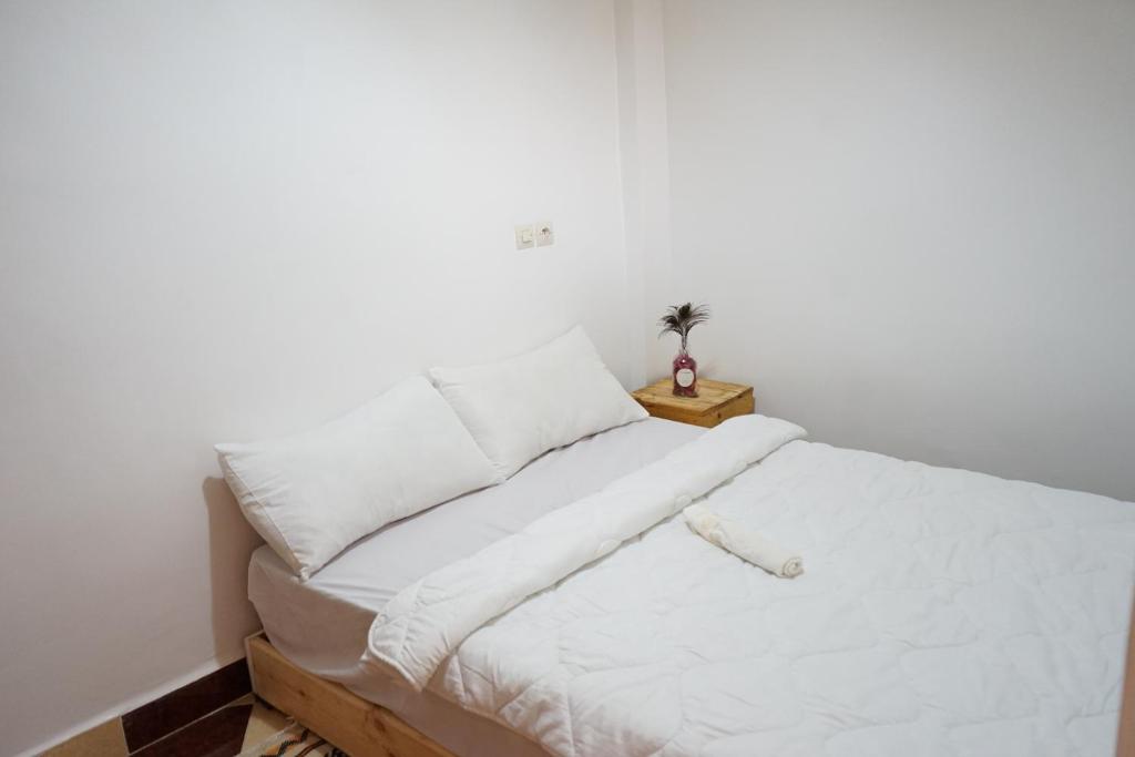 Postel nebo postele na pokoji v ubytování Epicswellhouse