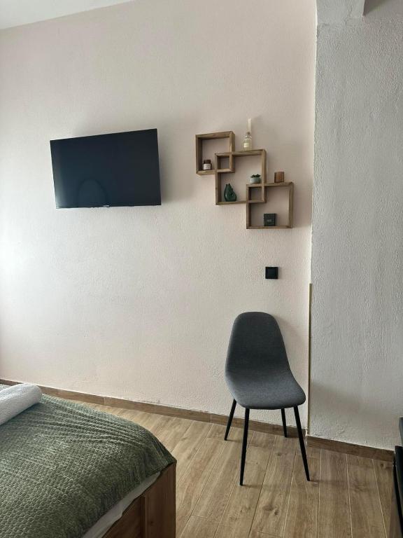 TV a/nebo společenská místnost v ubytování Zante Art de l'eau