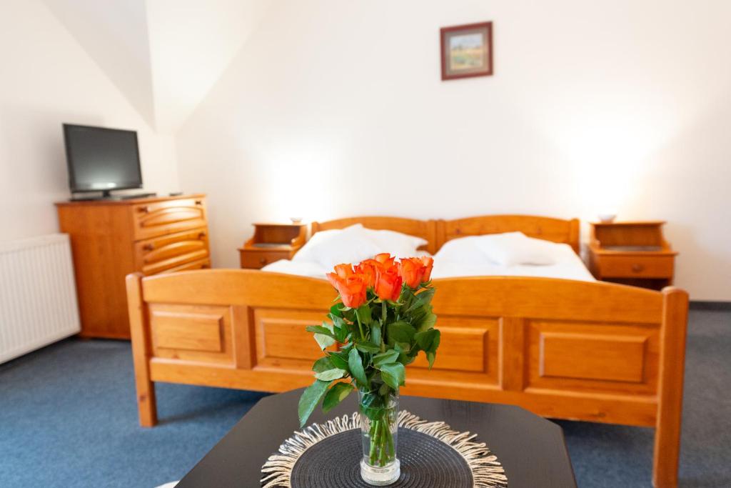 Postel nebo postele na pokoji v ubytování Pension Najdek