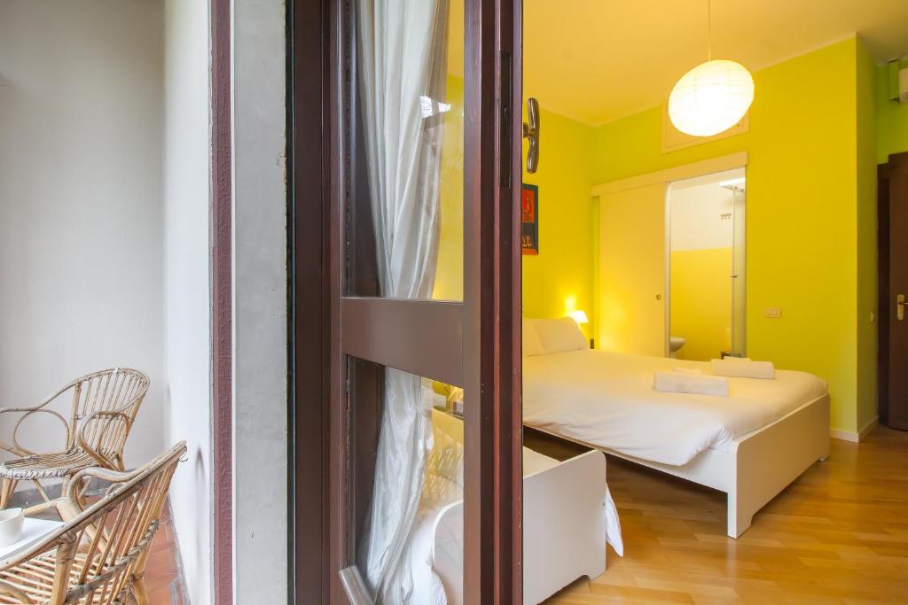 Postel nebo postele na pokoji v ubytování Villa Paradis B&B