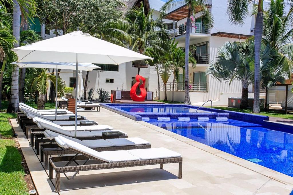 Kolam renang di atau dekat dengan PENTHOUSE en VIA 38 PLAYA DEL CARMEN