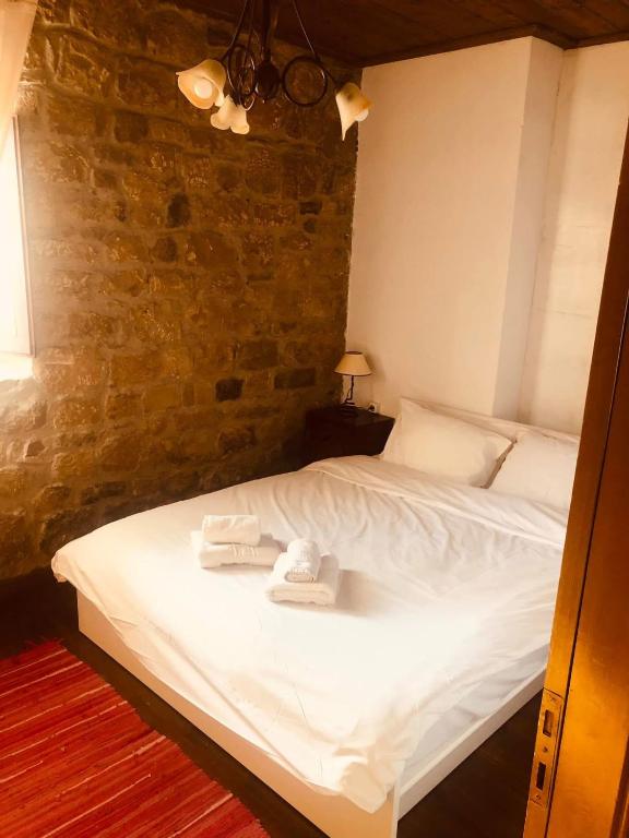 Postel nebo postele na pokoji v ubytování Helydorea zen BED& BREAKFAST
