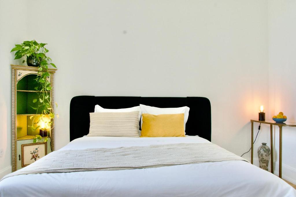 Postel nebo postele na pokoji v ubytování Vila Julieta Guesthouse