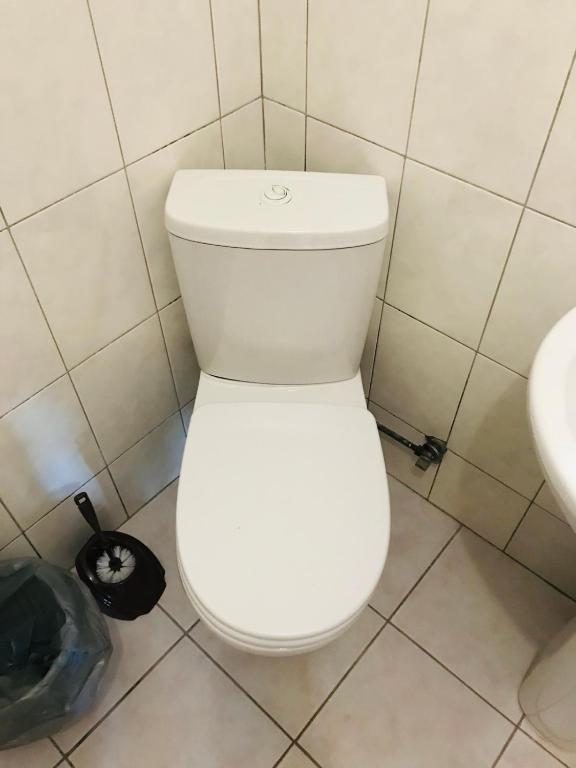 Koupelna v ubytování Guest House KARTA F M