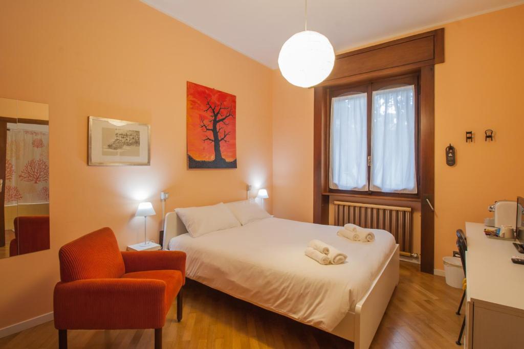 Postel nebo postele na pokoji v ubytování Villa Paradis B&B
