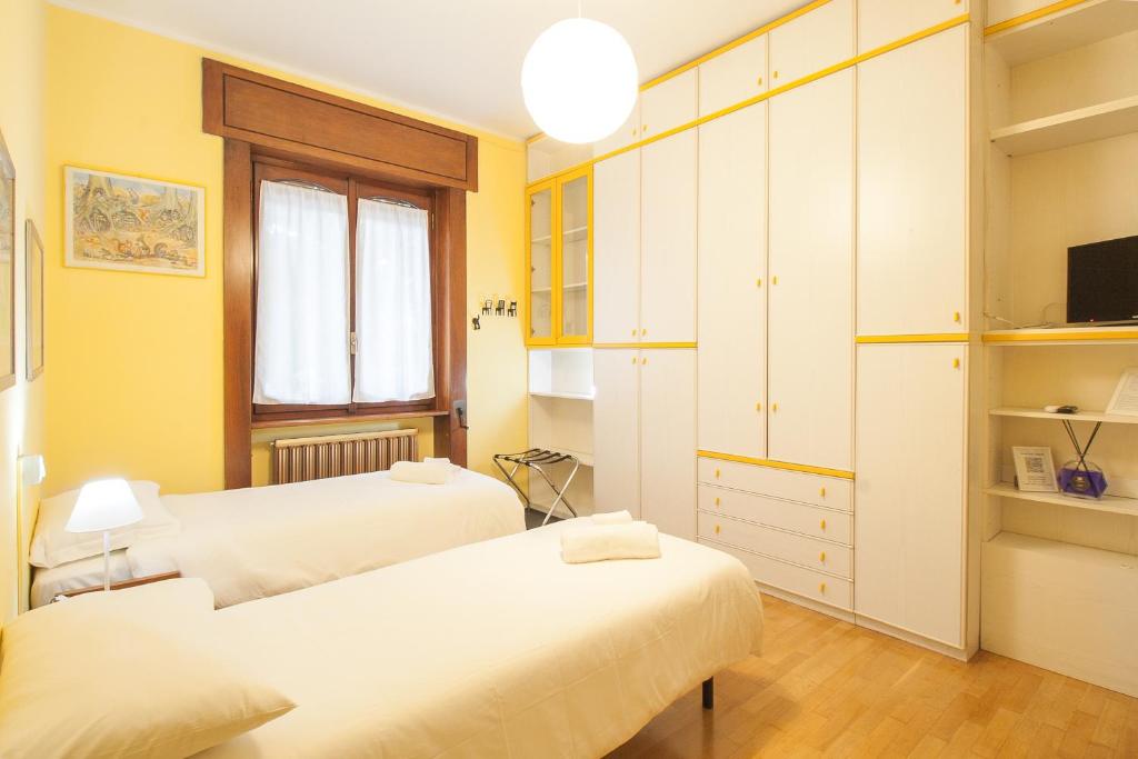 Postel nebo postele na pokoji v ubytování Villa Paradis B&B
