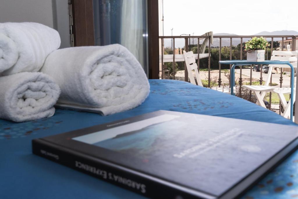 Łóżko lub łóżka w pokoju w obiekcie Caletta sul Mare