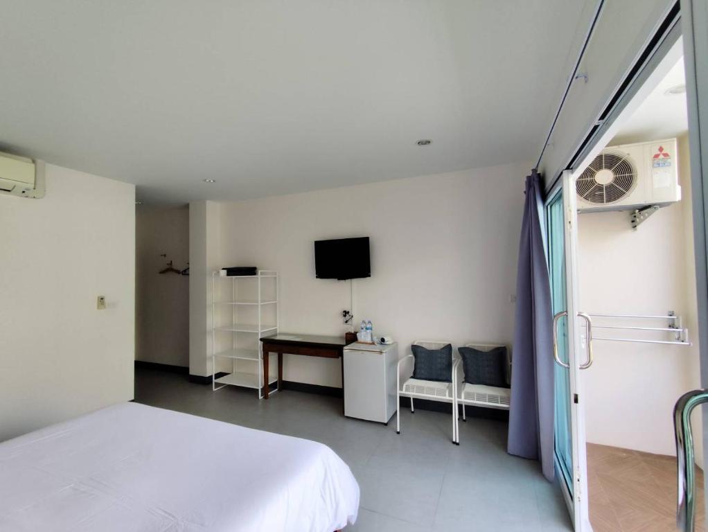 Letto o letti in una camera di The 9th House