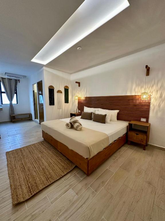 Postel nebo postele na pokoji v ubytování Digital Nomads Hotel & CoLiving