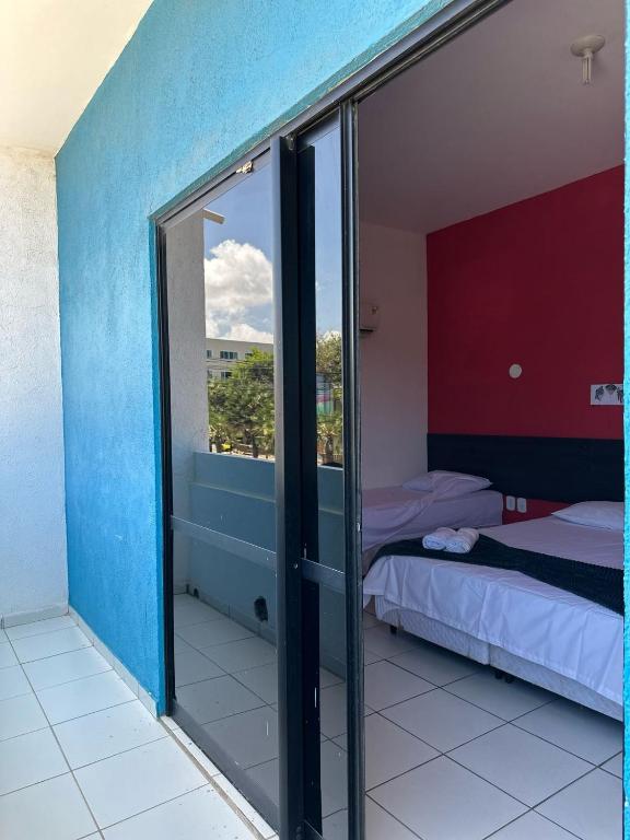 Postel nebo postele na pokoji v ubytování Pousada e Restaurante Kaizen