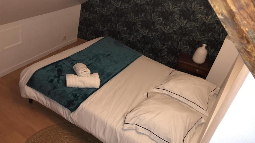 Posteľ alebo postele v izbe v ubytovaní *La douce étape des Châteaux *