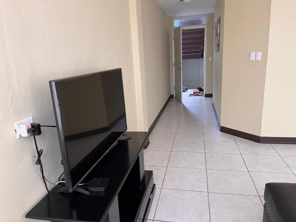TV a/nebo společenská místnost v ubytování Aparta-hotel Carmela #4 Aire acondicionado