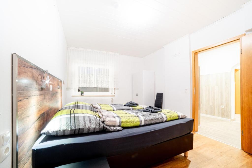 Postel nebo postele na pokoji v ubytování Ferienwohnung Bernd