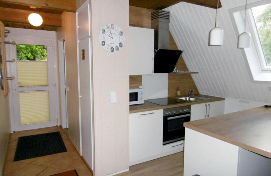 Kuchyň nebo kuchyňský kout v ubytování Ferienhaus Ida am Twistesee