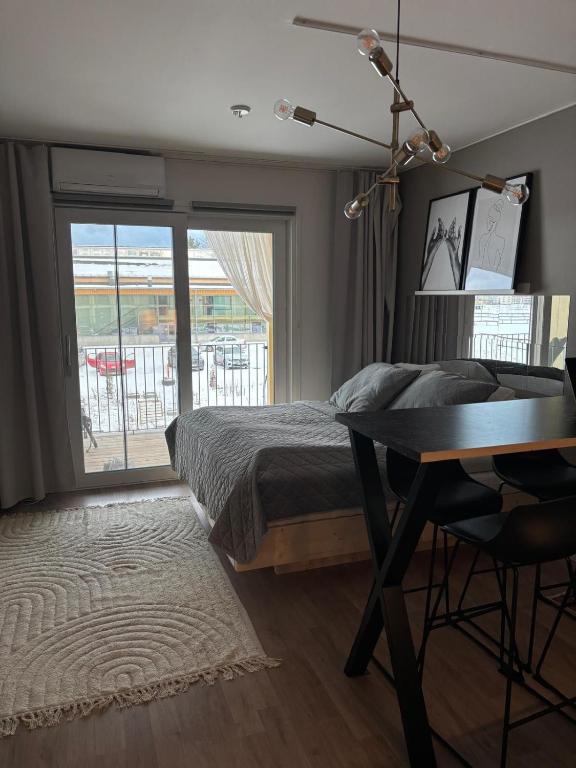 Ένα ή περισσότερα κρεβάτια σε δωμάτιο στο Modern studio apartment near the station