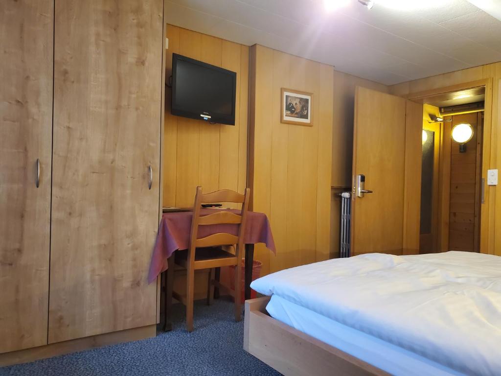 Postel nebo postele na pokoji v ubytování Hotel Garni Alpenruh