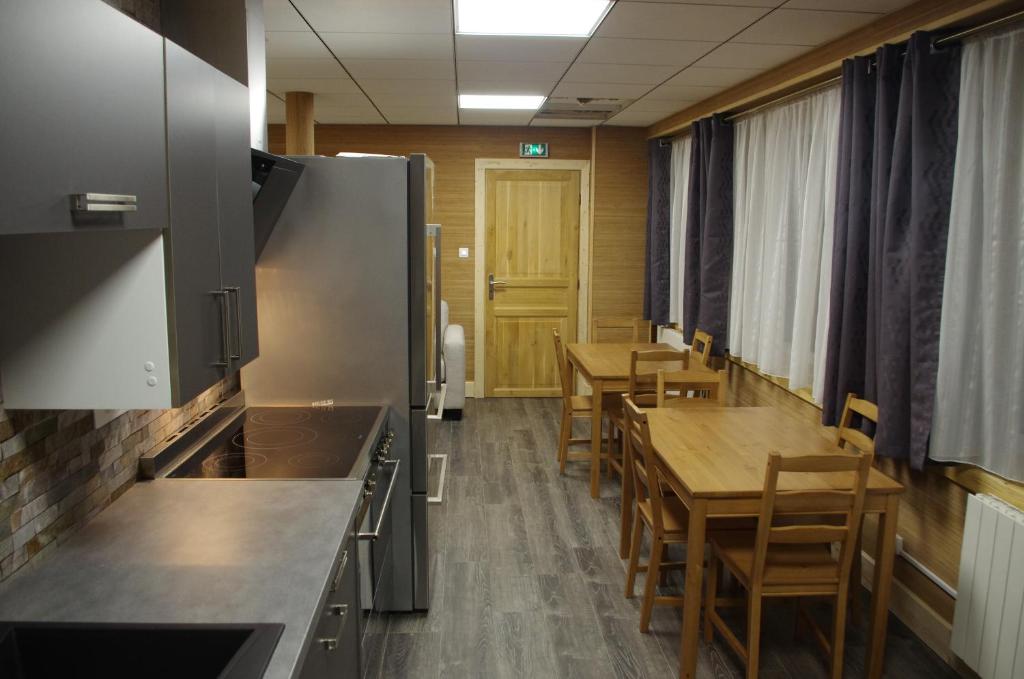 Kuchyň nebo kuchyňský kout v ubytování Loc Appart SPM Chambre d'hôtes 1