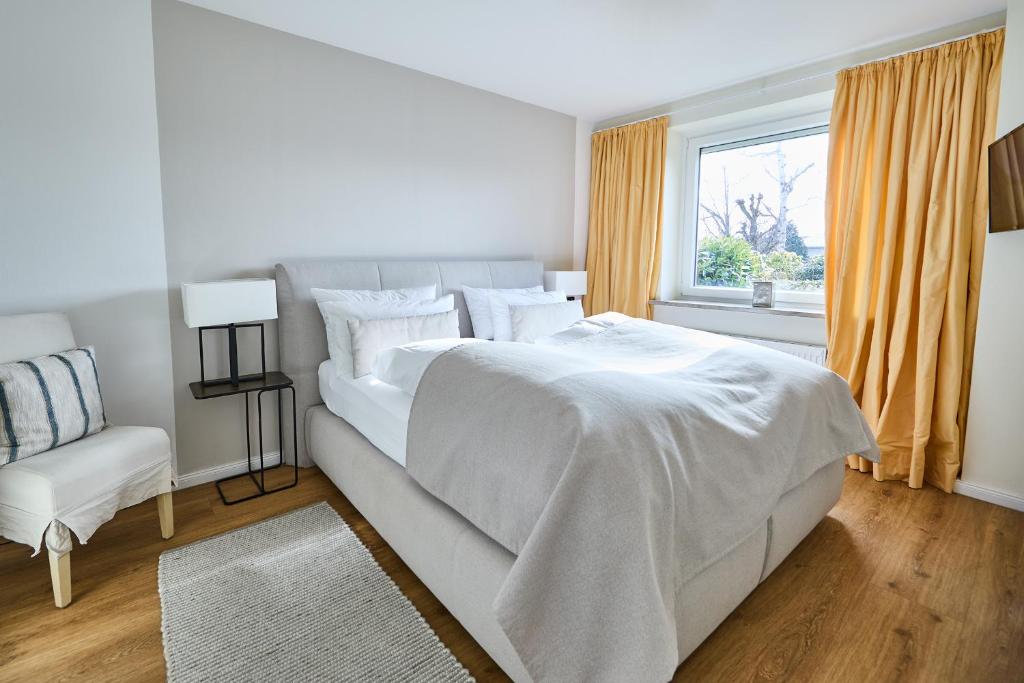 Postel nebo postele na pokoji v ubytování Techts Apartmenthaus