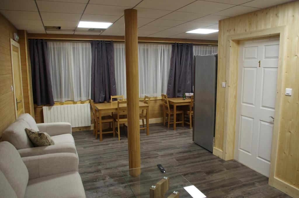 Posezení v ubytování Loc Appart SPM Chambre d'hôtes 1