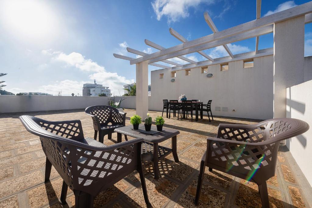 En balkon eller terrasse på Baia Verde Apartment