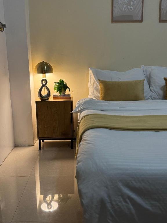 Postel nebo postele na pokoji v ubytování Bridgeview Residences