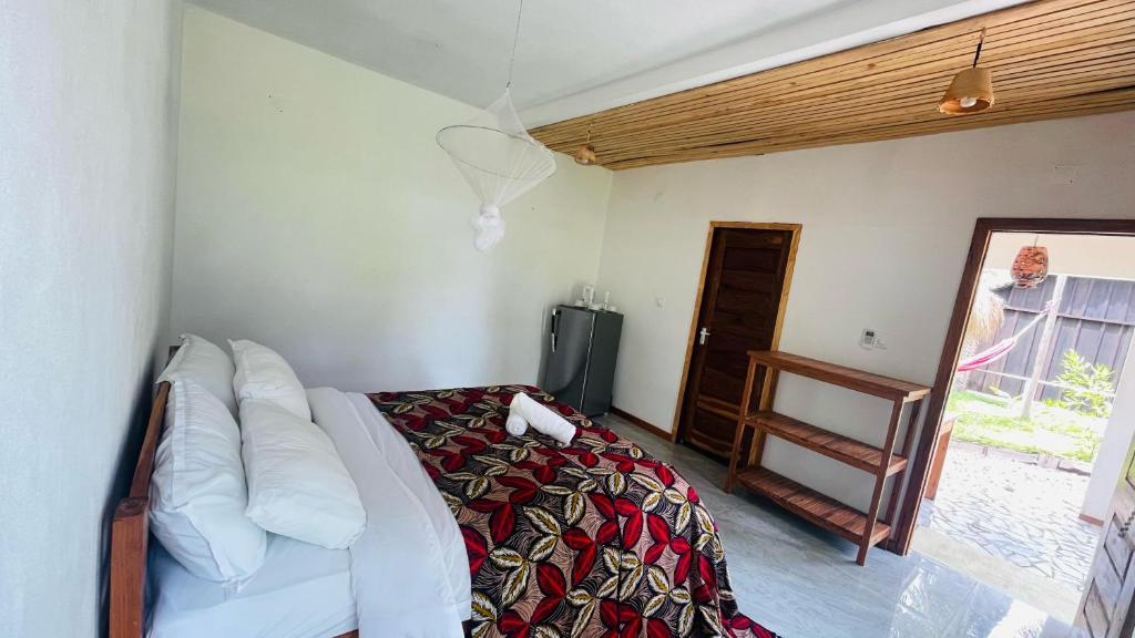 Postel nebo postele na pokoji v ubytování CosyBe Villas