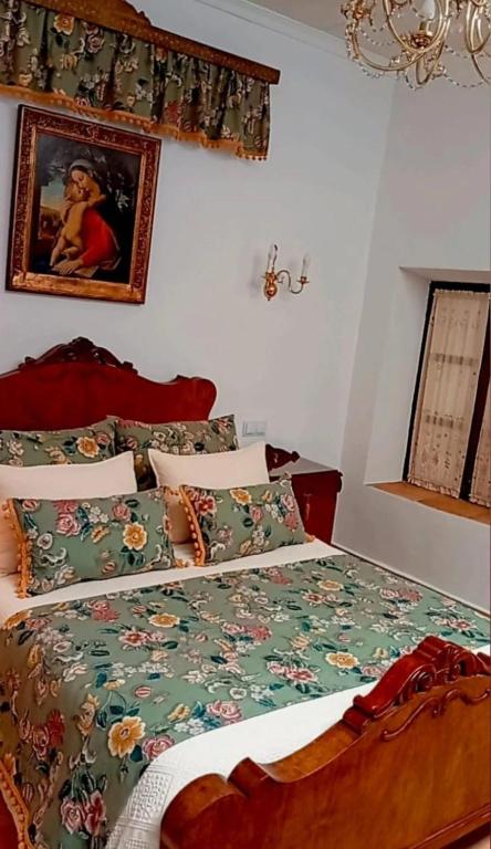 Cama o camas de una habitación en Casa Rural en San Carlos del Valle- Doña Gumersinda