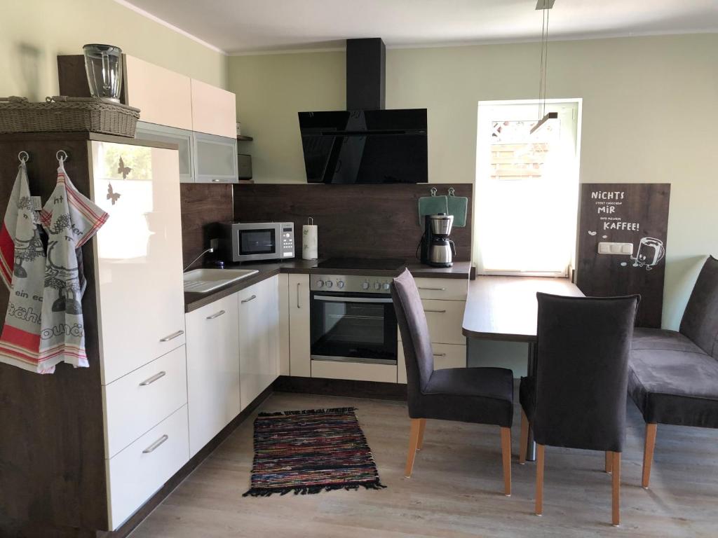 Kuchyň nebo kuchyňský kout v ubytování Ferienwohnung Adler