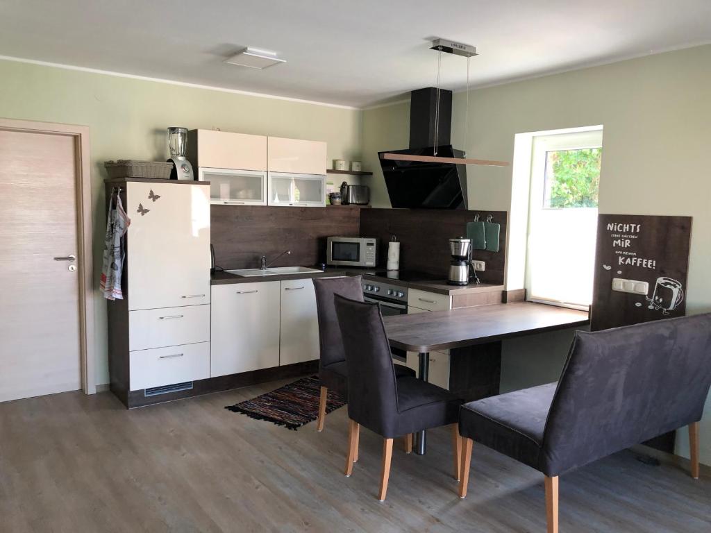 Kuchyň nebo kuchyňský kout v ubytování Ferienwohnung Adler