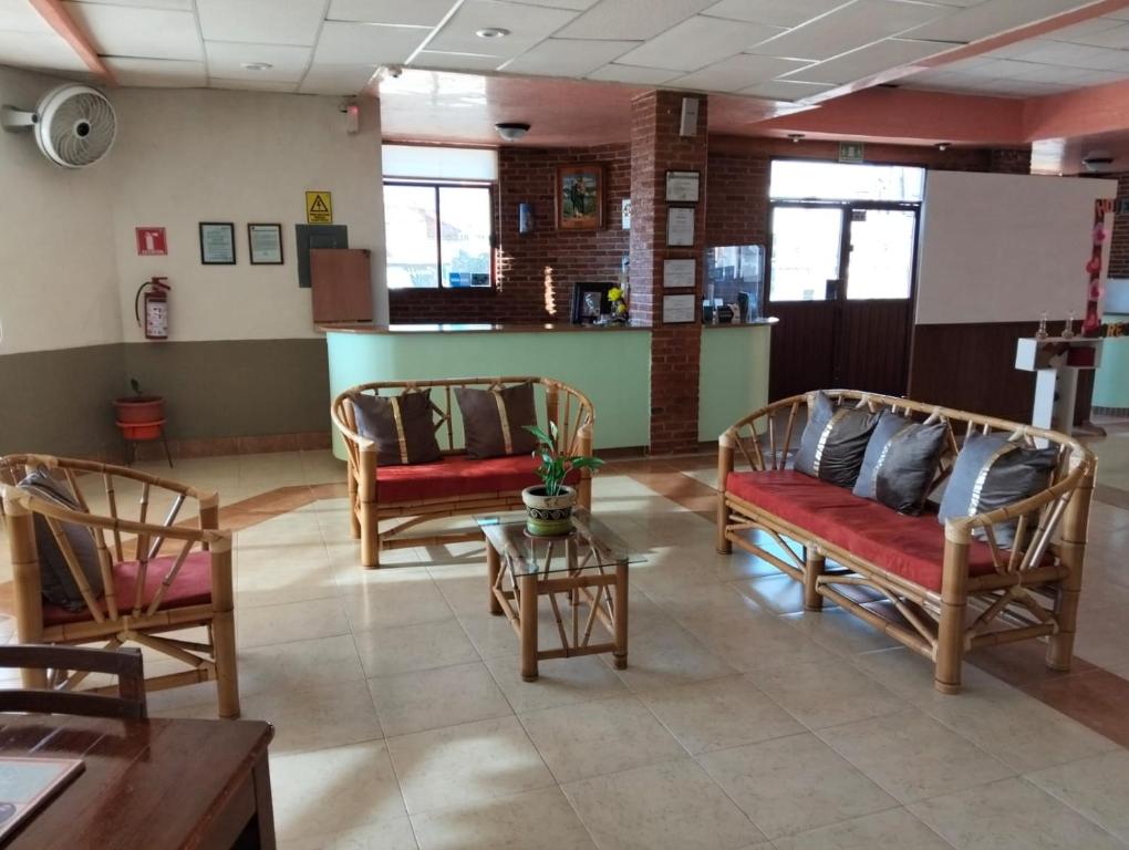 Posezení v ubytování Hotel Tres Flores