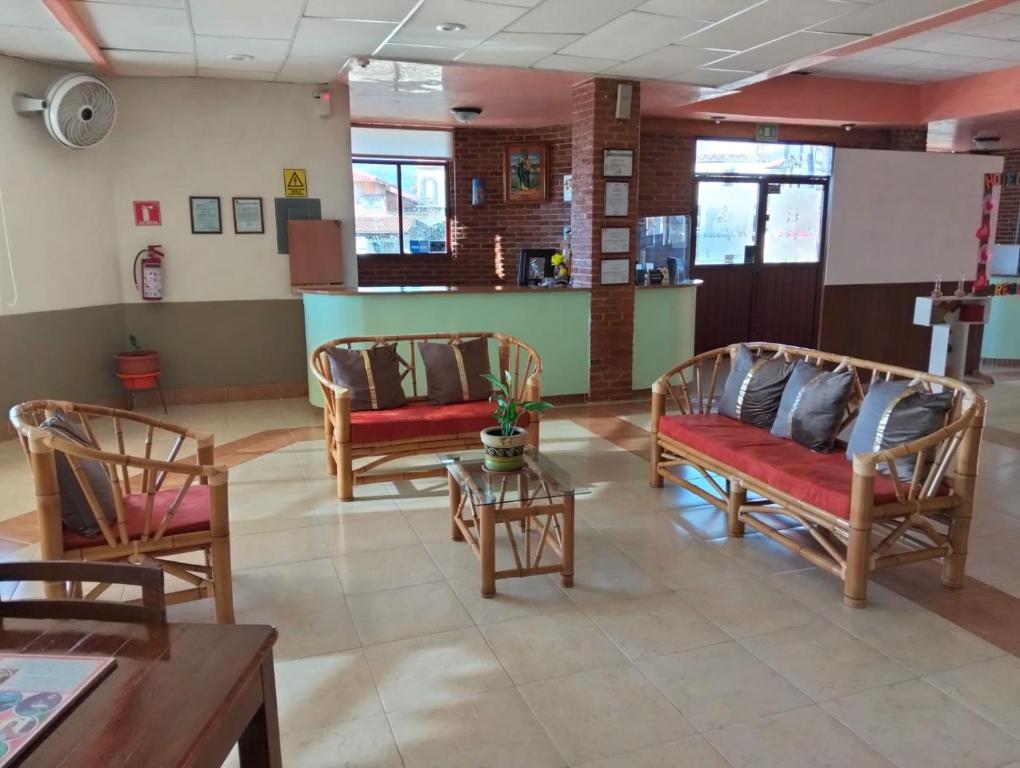 Posezení v ubytování Hotel Tres Flores