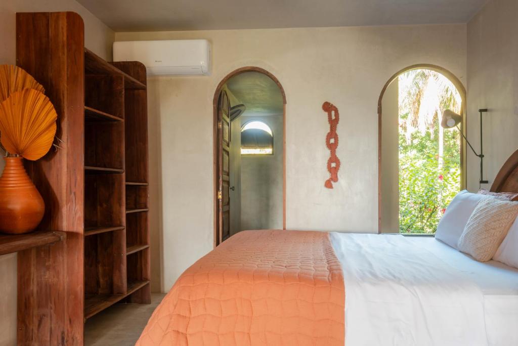 Postel nebo postele na pokoji v ubytování Benção Hotel