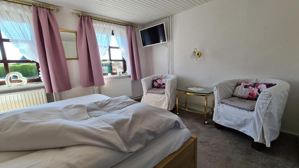 Postel nebo postele na pokoji v ubytování Appartement Nummer 26