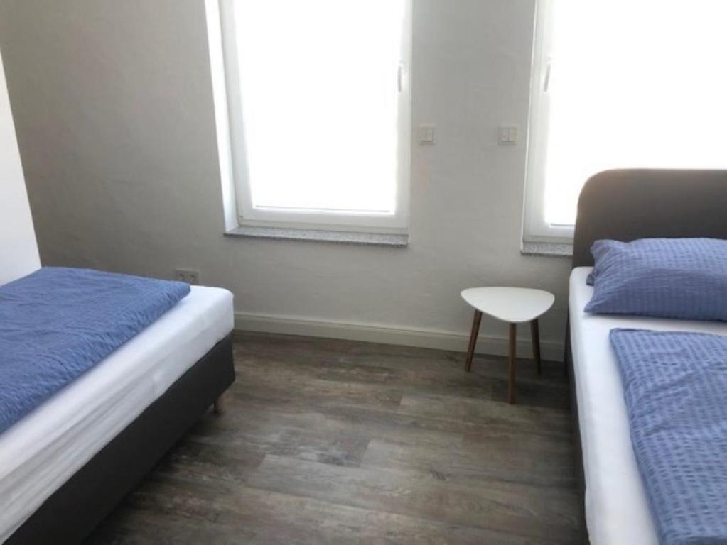 Postel nebo postele na pokoji v ubytování Trafohaus