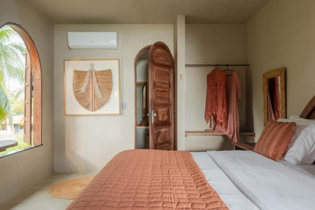 Postel nebo postele na pokoji v ubytování Benção Hotel