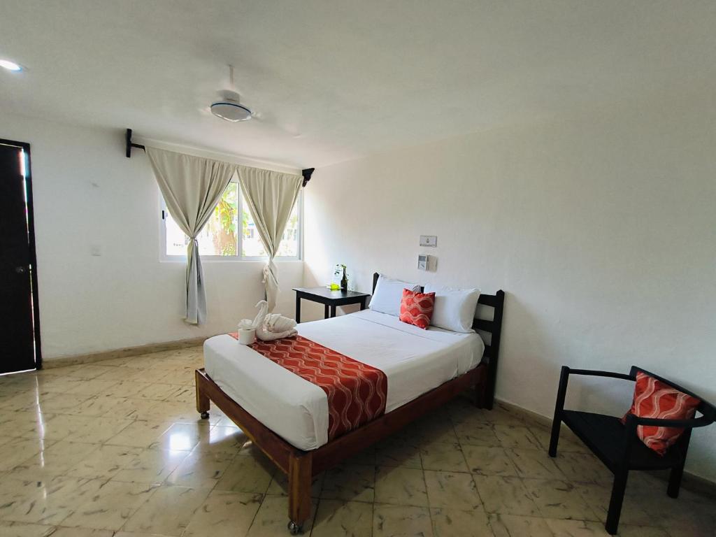 Postel nebo postele na pokoji v ubytování Hotel Don Luis