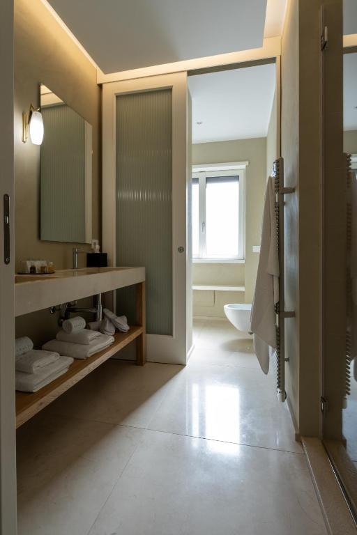 Koupelna v ubytování Abalto Suites & Rooms