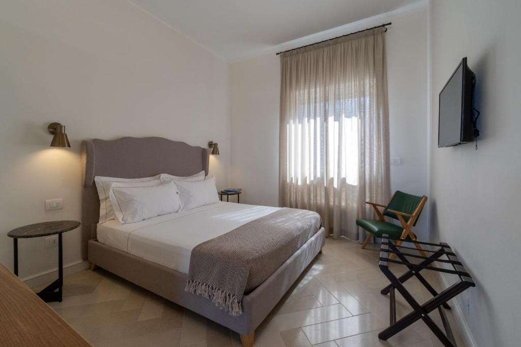 Postel nebo postele na pokoji v ubytování Abalto Suites & Rooms