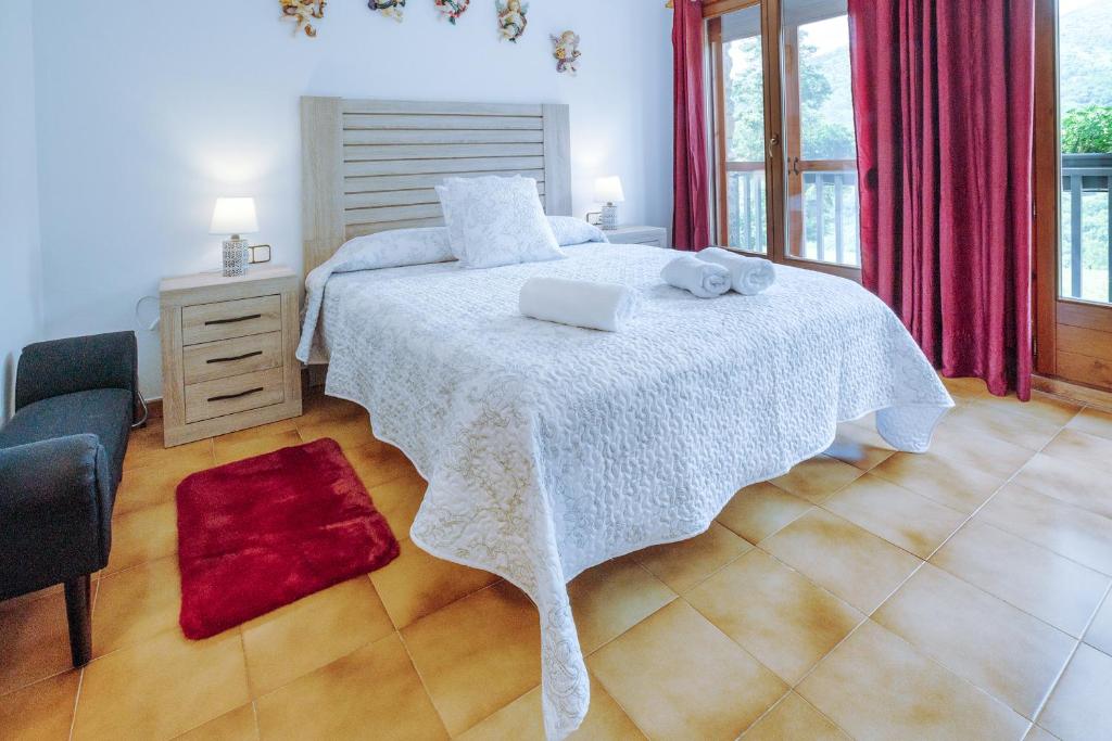 Posteľ alebo postele v izbe v ubytovaní Casa Joana - Apartamento Lo Pamano