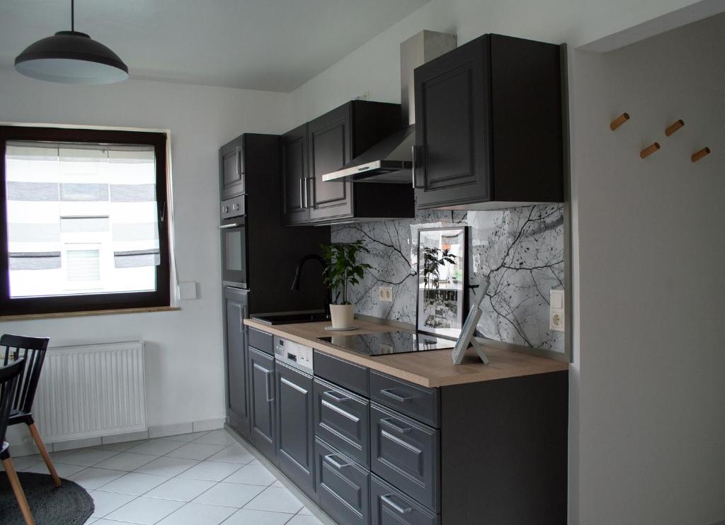 Kuchyň nebo kuchyňský kout v ubytování Ferienwohnung Kurz "Weinbergblick"